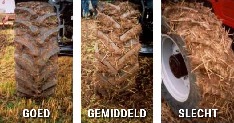 opgehoopte aarde tussen de nokken van de tractorband